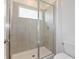 Modern bathroom with a large shower and tile surround at 17339 Peregrine Way, Punta Gorda, FL 33982