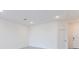 Open concept living area with sliding glass doors and high ceilings at 17339 Peregrine Way, Punta Gorda, FL 33982