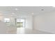 Bright and airy living room with access to the backyard at 17339 Peregrine Way, Punta Gorda, FL 33982