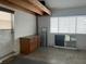 Garage with cabinets and overhead storage at 1620 Lakeview Pl, Englewood, FL 34223