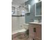 Clean bathroom with a shower/tub combo and updated fixtures at 1620 Lakeview Pl, Englewood, FL 34223