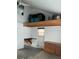 Garage with workshop, cabinets, and overhead storage at 1620 Lakeview Pl, Englewood, FL 34223