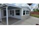 View of the garage and backyard at 1620 Lakeview Pl, Englewood, FL 34223