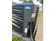 View of the home's exterior AC unit at 1620 Lakeview Pl, Englewood, FL 34223