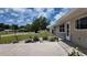 Front view of a ranch style house with a nicely landscaped front yard at 1620 Lakeview Pl, Englewood, FL 34223