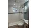 Clean bathroom with a shower/tub combo and updated fixtures at 1620 Lakeview Pl, Englewood, FL 34223
