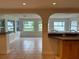 Bright sunroom with multiple windows and tiled floor at 1620 Lakeview Pl, Englewood, FL 34223