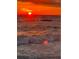 Vibrant sunrise over the ocean, reflecting on the water at 1433 S Belcher Rd # C1, Clearwater, FL 33764