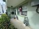 Inviting front porch with festive holiday decor and landscaping at 1433 S Belcher Rd # C1, Clearwater, FL 33764