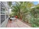 Private patio with table and chairs, perfect for outdoor dining at 1433 S Belcher Rd # C1, Clearwater, FL 33764