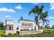 Community entrance sign with landscaping and a water feature at 9034 Sandy Bluffs Cir, Parrish, FL 34219