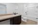 Bathroom with single vanity and shower/tub combo at 9034 Sandy Bluffs Cir, Parrish, FL 34219