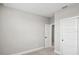 Empty bedroom with gray walls and carpet flooring at 101 Runaway Field Ave, Nokomis, FL 34275