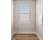 Laundry Room with window and tile floor at 101 Runaway Field Ave, Nokomis, FL 34275