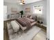 Spacious bedroom with light walls, wood flooring and a ceiling fan at 4104 W Gray St, Tampa, FL 33609