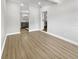 Spacious bedroom with wood-look floors and ample closet space at 4104 W Gray St, Tampa, FL 33609