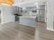 Modern kitchen with light gray cabinets and an island at 4104 W Gray St, Tampa, FL 33609