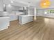 Modern kitchen with gray cabinets and breakfast bar at 4104 W Gray St, Tampa, FL 33609