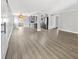 Open concept kitchen with stainless steel appliances and island at 4104 W Gray St, Tampa, FL 33609