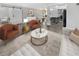 Bright living room featuring stylish furniture and hardwood floors at 4104 W Gray St, Tampa, FL 33609