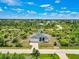 Aerial view of single-Gathering home and surrounding area at 9573 Shelburne Cir, Port Charlotte, FL 33981