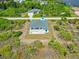 Aerial view of single-Gathering home with pool at 9573 Shelburne Cir, Port Charlotte, FL 33981