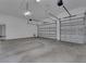 Large garage with two automatic doors and ample storage at 9573 Shelburne Cir, Port Charlotte, FL 33981