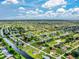 Aerial view of a house near a waterway in a residential community at 287 Mariner Ln, Rotonda West, FL 33947