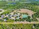 Aerial view of a park with tennis courts and playground at 287 Mariner Ln, Rotonda West, FL 33947