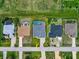 Aerial view showcasing a row of houses in a residential community at 287 Mariner Ln, Rotonda West, FL 33947