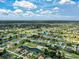 Property view showcasing location near golf course and waterway at 287 Mariner Ln, Rotonda West, FL 33947