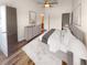 Spacious main bedroom with hardwood floors and a large bed at 8882 Christie Dr, Largo, FL 33771