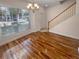 Bright dining room with hardwood floors and a staircase at 8882 Christie Dr, Largo, FL 33771