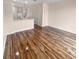 Spacious living room with hardwood floors and kitchen views at 8882 Christie Dr, Largo, FL 33771