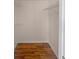 Walk-in closet with wire shelving and hardwood floors at 8882 Christie Dr, Largo, FL 33771
