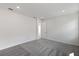 Neutral bedroom features carpeted floors and a closet at 9584 Vibrant Lane, Venice, FL 34292