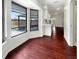Dining area filled with natural light, offering a view of the backyard and pool area at 7087 Spinnaker Blvd, Englewood, FL 34224