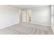 Spacious bedroom with carpet and private bathroom access at 7628 Intrepid Rd, Wesley Chapel, FL 33545