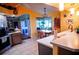Bright kitchen with island, breakfast nook, and water views at 4202 Perch Cir, Port Charlotte, FL 33948