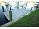 Wooden dock with boat lift on calm water at 4202 Perch Cir, Port Charlotte, FL 33948