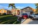 Exterior of a single-story home with a two-car garage at 4202 Perch Cir, Port Charlotte, FL 33948