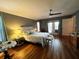 Main bedroom with hardwood floors and direct access to the patio at 4202 Perch Cir, Port Charlotte, FL 33948