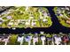 Aerial view of waterfront homes and community at 4202 Perch Cir, Port Charlotte, FL 33948