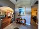 Inviting entryway with tiled floors and views into the living and dining areas at 4202 Perch Cir, Port Charlotte, FL 33948