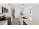 Modern kitchen with stainless steel appliances and granite countertops at 428 Lazy Shore Dr, Nokomis, FL 34275