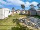 Large backyard featuring storage sheds and ample outdoor space at 548 47Th N Ave, St Petersburg, FL 33703