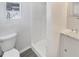 Functional bathroom featuring a shower and vanity with ample lighting at 548 47Th N Ave, St Petersburg, FL 33703