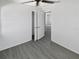 This bedroom features a ceiling fan and a closet with ample storage space at 548 47Th N Ave, St Petersburg, FL 33703
