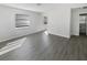 Open bonus room featuring neutral walls, flooring, and natural light from two windows at 548 47Th N Ave, St Petersburg, FL 33703