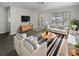 Bright living room with modern furnishings and a stylish black-and-white rug at 548 47Th N Ave, St Petersburg, FL 33703